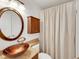 View of the bathroom featuring a vessel sink and granite counters at 124 Wynntry Dr, Henderson, NV 89074