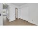Bedroom featuring tile floors, a closet, and a door to the hallway at 124 Wynntry Dr, Henderson, NV 89074