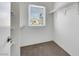 Walk-in closet offering ample storage with built-in shelving and a view from the window at 124 Wynntry Dr, Henderson, NV 89074