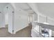 Hallway featuring carpet flooring and a railing with views to the level below at 124 Wynntry Dr, Henderson, NV 89074