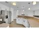 Kitchen with stainless steel appliances, granite countertops, and breakfast bar at 124 Wynntry Dr, Henderson, NV 89074