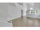 Bright living room features tile floors, high ceilings and a staircase at 124 Wynntry Dr, Henderson, NV 89074