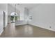 Spacious living room featuring tile floors, high ceilings and sliding glass doors at 124 Wynntry Dr, Henderson, NV 89074