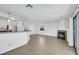 Bright, open-concept space features tile floors, kitchen bar, and a fireplace at 124 Wynntry Dr, Henderson, NV 89074