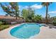 Backyard pool featuring steps for entry and a small water feature at 124 Wynntry Dr, Henderson, NV 89074