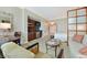 Comfortable living room with kitchenette featuring modern appliances, wooden cabinets and stylish decor at 125 E Harmon Ave # 318, Las Vegas, NV 89109