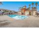 Serene community pool offers a refreshing escape with ample lounge seating and manicured landscaping at 1525 Spiced Wine Ave # 19103, Henderson, NV 89074