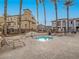 Inviting community spa area framed by towering palm trees and modern architecture at 1525 Spiced Wine Ave # 19103, Henderson, NV 89074