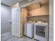 Convenient laundry room with modern washer and dryer at 1525 Spiced Wine Ave # 19103, Henderson, NV 89074