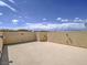 Expansive rooftop deck offering ample space for entertaining with stucco walls at 1525 Spiced Wine Ave # 19103, Henderson, NV 89074