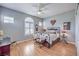 Inviting bedroom with wood floors, natural light, and soothing gray walls at 1564 Fieldbrook St, Henderson, NV 89052