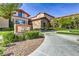 Attractive fitness and activities center with stone accents and lush landscaping near a parking area at 1564 Fieldbrook St, Henderson, NV 89052