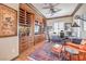 Spacious home office featuring custom built-ins, a wine rack, and an inviting leather chair at 1564 Fieldbrook St, Henderson, NV 89052