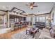 Open floorplan connecting the kitchen and living area, complete with modern decor at 1564 Fieldbrook St, Henderson, NV 89052