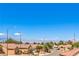 View of the neighborhood with tree-lined streets and distant mountain views at 1564 Fieldbrook St, Henderson, NV 89052