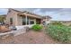Landscaped backyard features a covered patio with gorgeous views at 2110 King Mesa Dr, Henderson, NV 89012