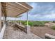 Covered patio boasts scenic vistas and views of nearby hillside homes and mountains at 2110 King Mesa Dr, Henderson, NV 89012