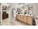 Bathroom with double sinks, a large mirror, and ample storage space at 2110 King Mesa Dr, Henderson, NV 89012