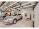Garage featuring an SUV and lots of storage and organization solutions for tools and equipment at 2110 King Mesa Dr, Henderson, NV 89012