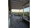 An inviting outdoor patio area with stone pavers, lush landscaping, and scenic views at 2110 King Mesa Dr, Henderson, NV 89012