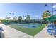 Outdoor pickleball courts with picnic tables, green surfaces, and a recreational sports environment at 2110 King Mesa Dr, Henderson, NV 89012