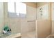 The shower offers a glass door and grab bars for convenience at 2128 Delmar Farms Ct, Laughlin, NV 89029