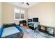 bedroom with a race car bed, a desk, and a TV at 2128 Delmar Farms Ct, Laughlin, NV 89029