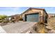 Lovely single-story home with low-maintenance landscaping and a paved driveway at 2128 Delmar Farms Ct, Laughlin, NV 89029