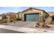 Charming single-story residence with low-maintenance desert landscaping and a modern facade at 2128 Delmar Farms Ct, Laughlin, NV 89029