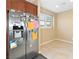 Stainless steel refrigerator with modern features in a neutral kitchen space at 2128 Delmar Farms Ct, Laughlin, NV 89029