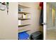 Organized pantry with corner shelving for ample storage solutions at 2128 Delmar Farms Ct, Laughlin, NV 89029