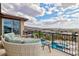 Enjoy the view from this comfortable balcony with ample seating and a pool view at 2153 King Crest Ct, Henderson, NV 89052
