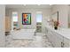 Bright bathroom features a soaking tub, double vanity, and decorative tile flooring at 2153 King Crest Ct, Henderson, NV 89052