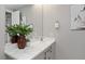 Elegant bathroom featuring a marble countertop, modern fixtures, and decorative accents at 2153 King Crest Ct, Henderson, NV 89052