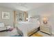 Cozy bedroom with patterned wallpaper, a comfortable bed, and stylish decor offering a relaxing environment at 2153 King Crest Ct, Henderson, NV 89052