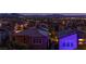 Nighttime view of a residential community with mountain views at 2153 King Crest Ct, Henderson, NV 89052