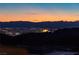 Nighttime city view showing city lights below mountain range at 2153 King Crest Ct, Henderson, NV 89052