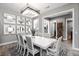 Beautiful dining room featuring unique wall art and a modern chandelier at 2153 King Crest Ct, Henderson, NV 89052