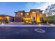 Stunning modern home with desert landscaping, two-car garage and manicured front yard at 2153 King Crest Ct, Henderson, NV 89052