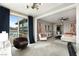 Open-concept space with a bedroom, living and work area, and scenic views at 2153 King Crest Ct, Henderson, NV 89052
