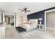 Chic bedroom featuring a stylish accent wall and a plush bed at 2153 King Crest Ct, Henderson, NV 89052
