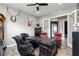 Sophisticated office with custom desk, leather chairs, and unique decorative pieces at 2153 King Crest Ct, Henderson, NV 89052