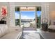 Living room showcasing seamless transition to the outdoor patio and pool area at 2153 King Crest Ct, Henderson, NV 89052