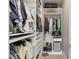 Walk-in closet with plentiful storage solutions and hanging space to keep your wardrobe organized at 2153 King Crest Ct, Henderson, NV 89052