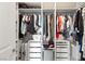 Bright, organized walk-in closet features built-in shelving and ample storage space at 2153 King Crest Ct, Henderson, NV 89052