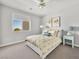 Bright bedroom featuring neutral walls, a window with blinds, and artwork above the bed at 220 Villa Borghese St, Las Vegas, NV 89138