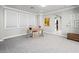 Spacious bedroom with a cozy sitting area and well-lit ambiance at 220 Villa Borghese St, Las Vegas, NV 89138