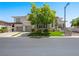 Beautiful two-story home featuring a three-car garage, manicured landscaping, and a well-maintained lawn at 220 Villa Borghese St, Las Vegas, NV 89138