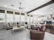 Open living room with lots of natural light, plush seating, and views of the dining area at 220 Villa Borghese St, Las Vegas, NV 89138