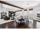 Bright living room with dark wood floors, fireplace, and a comfortable seating area at 220 Villa Borghese St, Las Vegas, NV 89138
